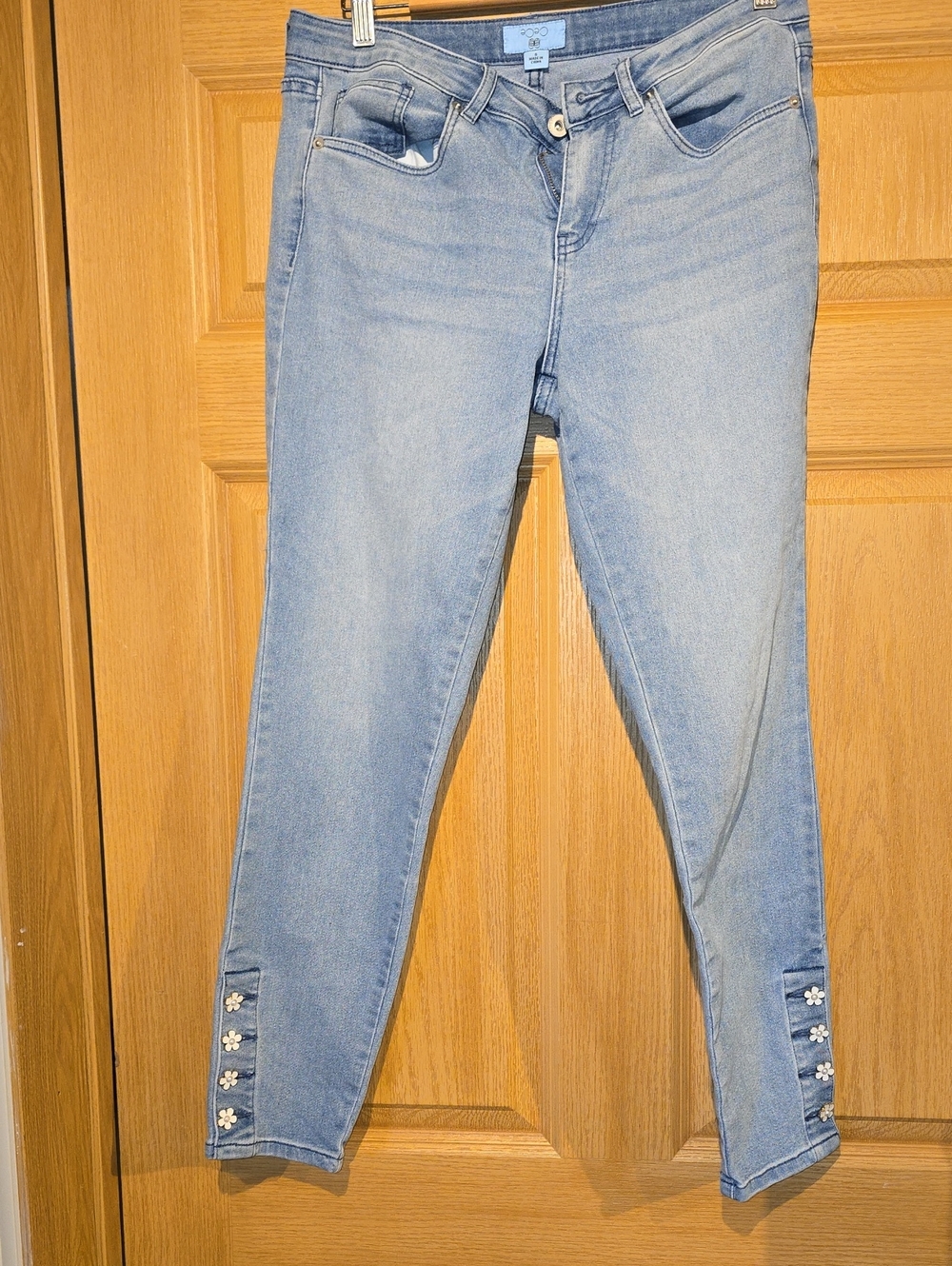 CeCe Light Blue Cropped Jeans with Floral Hem Buttons